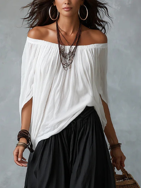 Ensemble blanc avec haut épaules dénudées et pantalon style lanterne