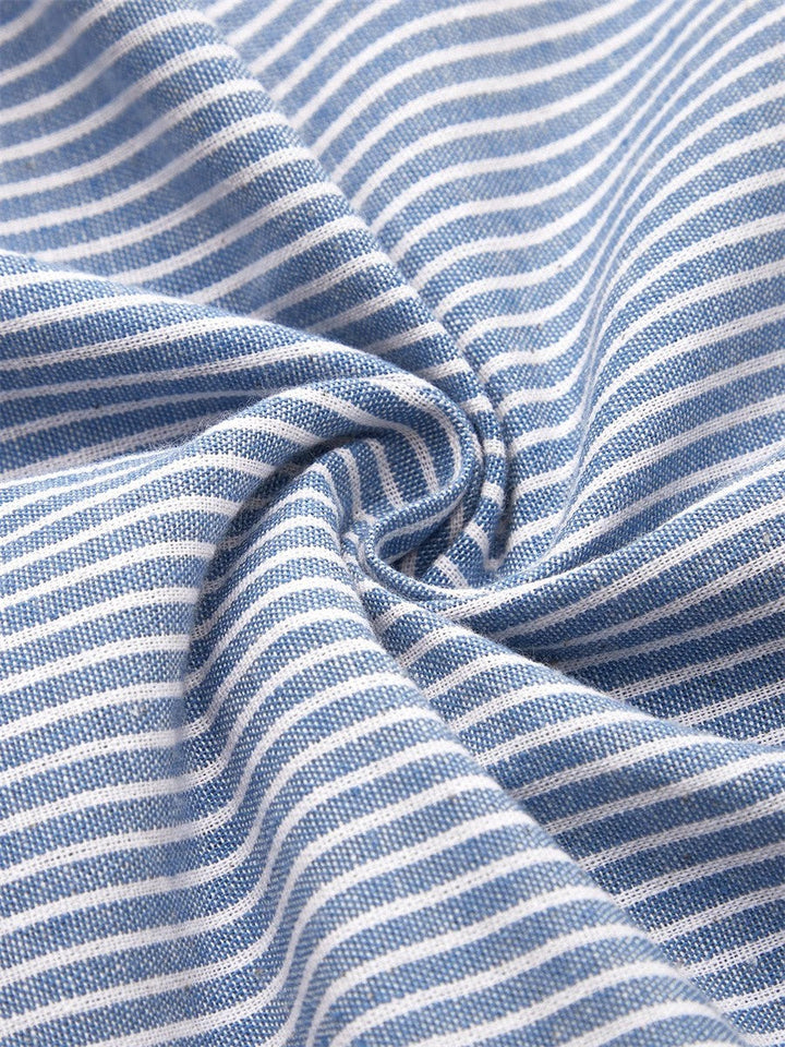 Jarna – Robe midi fluide et élégante rayée